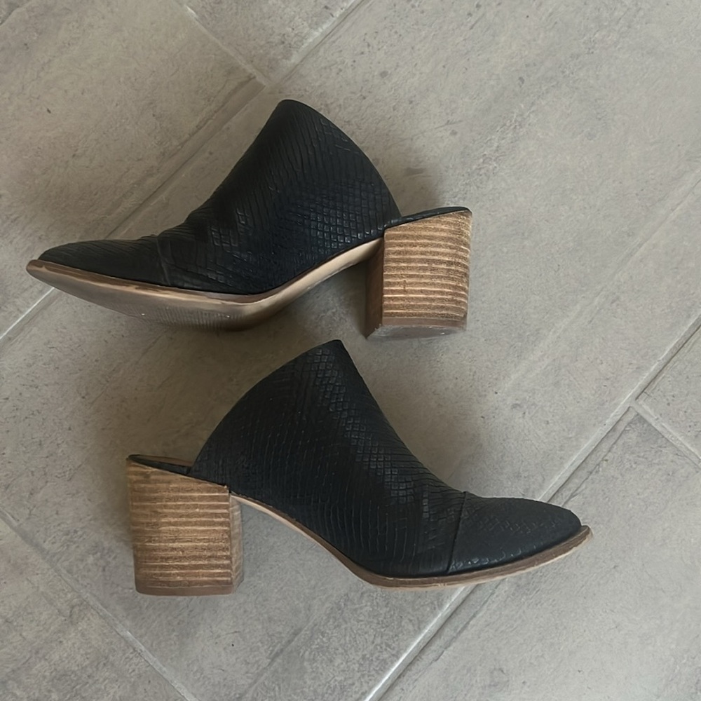 Edgy Black Leather Slip-on Booties